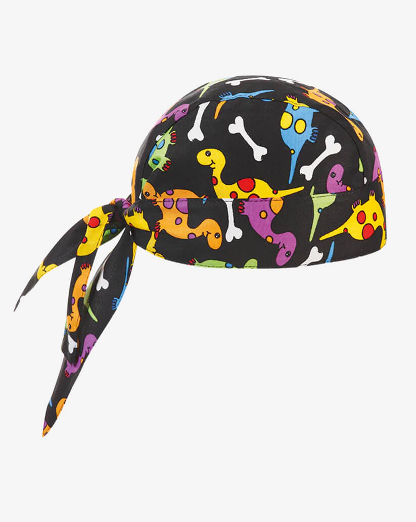 Bandana da cucina in cotone nera con stampa vivace di dinosauri colorati e ossi bianchi e lacci posteriori regolabili.