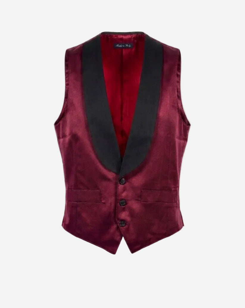 Gilet azzurro avio  con collo a contrasto nero; ed allacciatura centrale con bottoni in contrasto neri, fodera interna, tessuto stiro