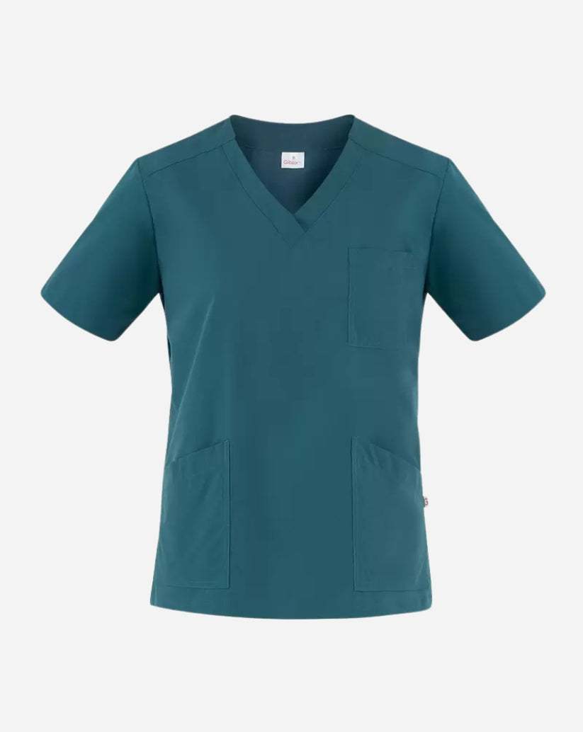 Casacca donna ottanio in poliestere con scollo a V, maniche corte, tre tasche frontali e spacchi laterali.