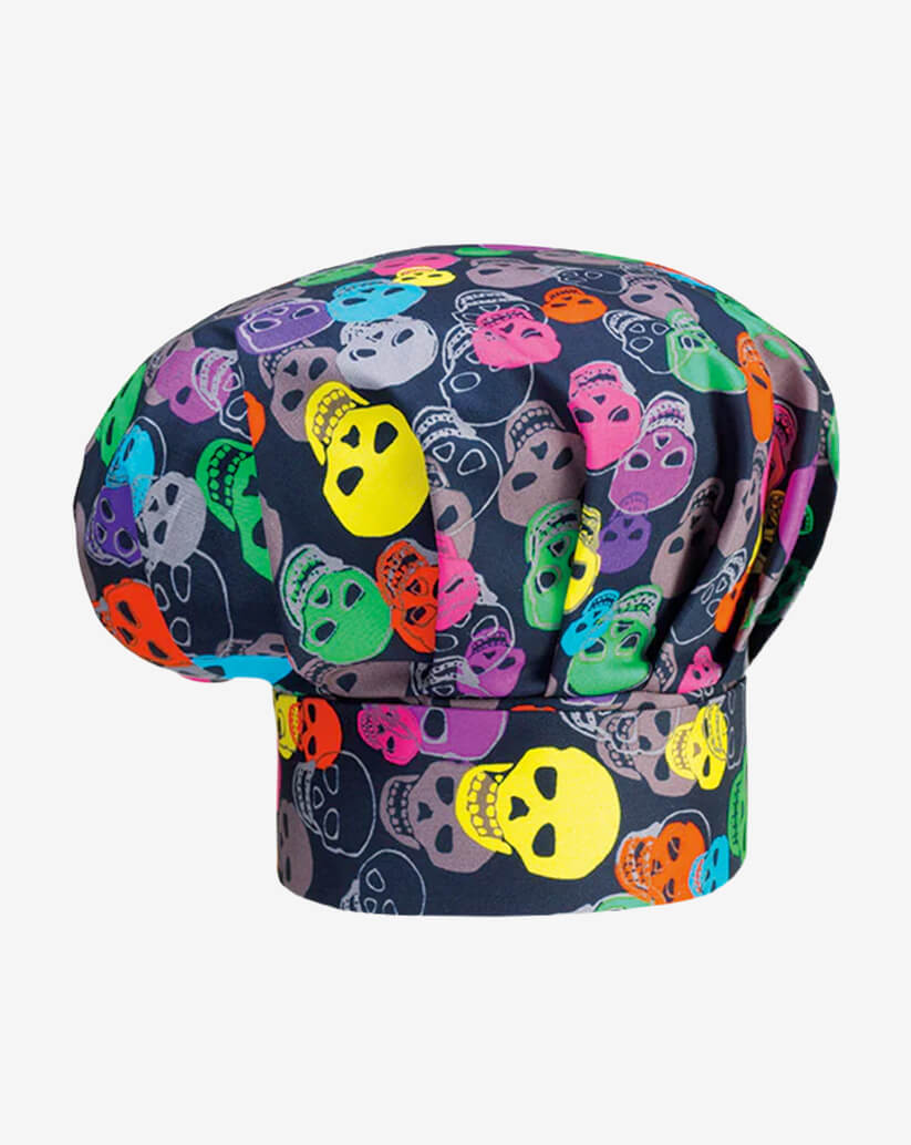 Cappello da cuoco nero in misto cotone con vivace fantasia multicolore a teschi messicani (calaveras) in tonalità neon, fascia piatta regolabile con velcro e parte superiore a sbuffo.