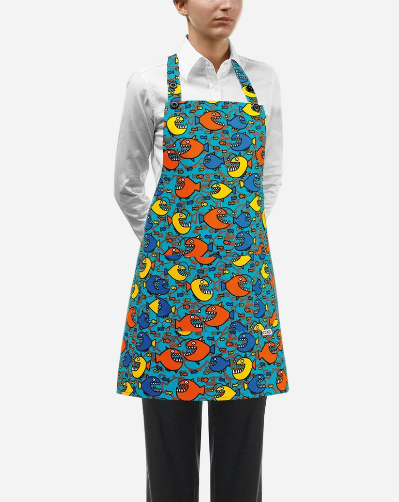 Grembiule donna con pettorina regolabile e due tasche fantasia squali su fondo turchese