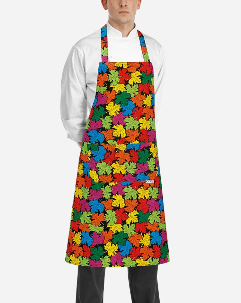 Grembiule unisex con pettorina regolabile e due tasche fantasia foglie colorate