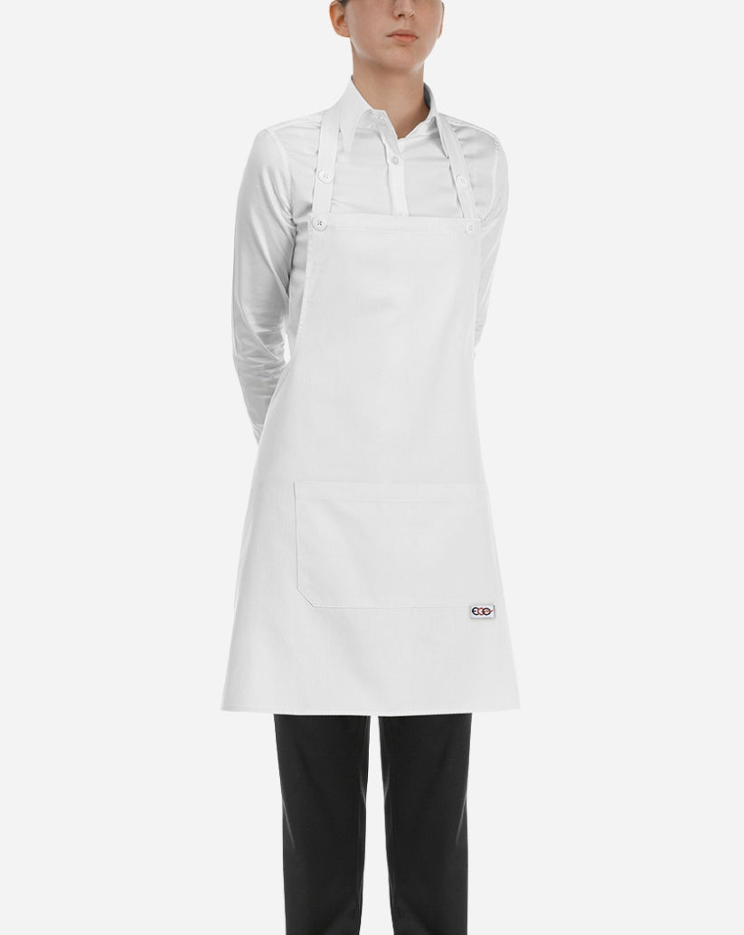 Grembiule a pettorina donna bianco in cotone  con chiusura regolabile al collo, bottoni e due tasche centrali applicate.