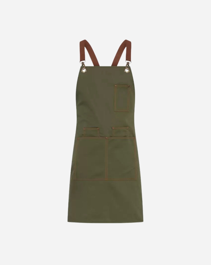 Grembiule unisex verde militare in poliestere e cotone con bretelle staccabili,  tre portapenne, due tasche ampie e vele in ottone.