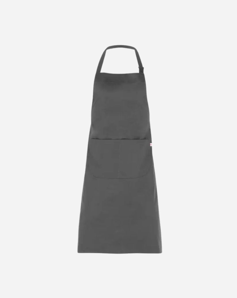 Grembiule grigio scuro in poliestere e cotone con laccio regolabile, fibbia canna da fucile e due tasche rinforzate da travette.